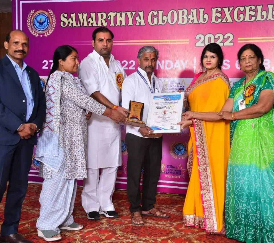 Receiving Samarthya Global Excellence Award in 2022