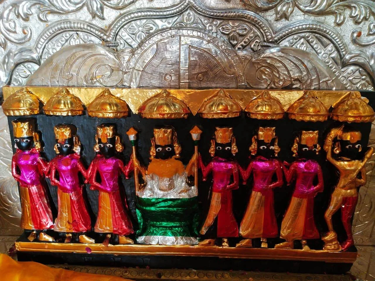 Decorated black color idol of Swangiya Mata with other 6 idols of sisters as goddesses and one brother as god in temple of Jaisalmer